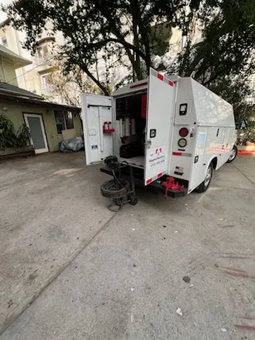 Magnet Plumbing service vehicle on-site for Grease Trap Cleaning in Los Feliz